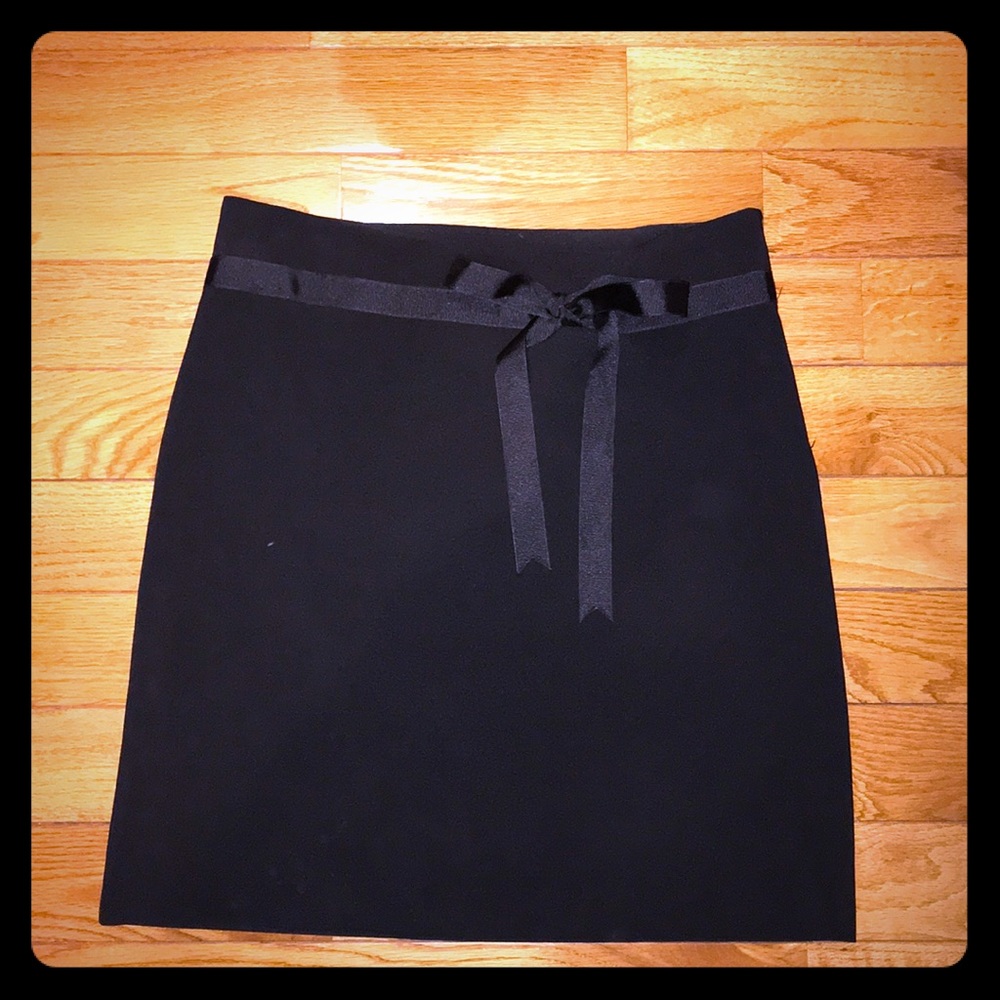 Cute black skirt with a bow